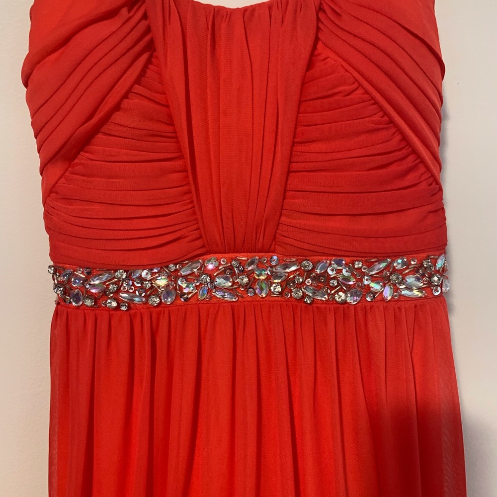 Long dress tangerine colored dress (new). Size 7.